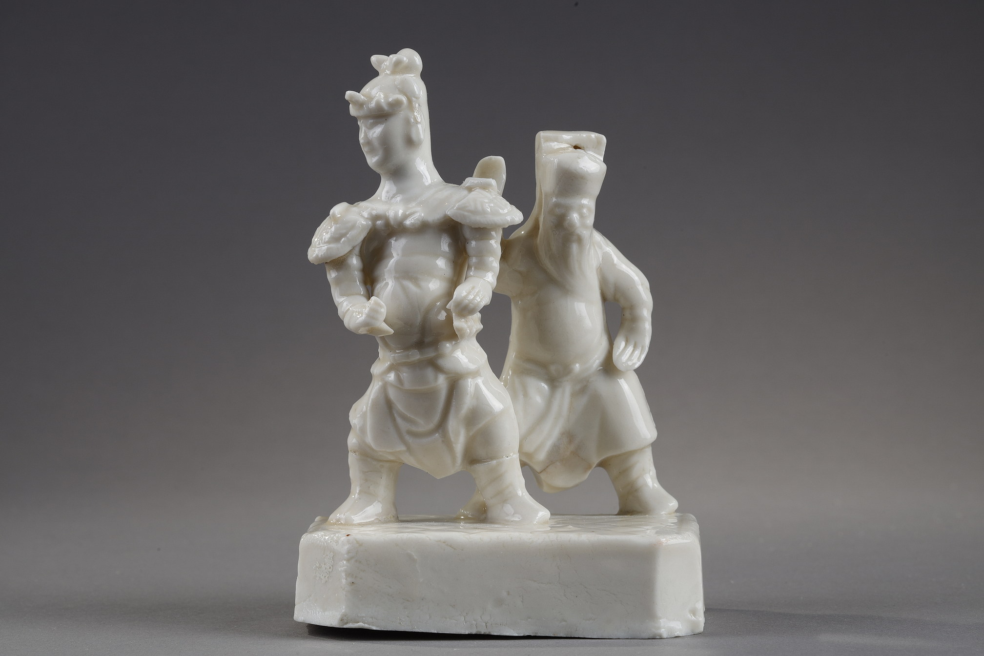 Group porcelain "blanc de Chine"  Guandi and attendant